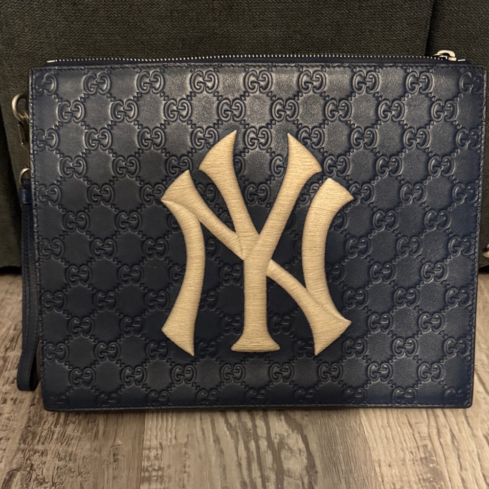 Gucci Navy Embossed NY Logo Pouch